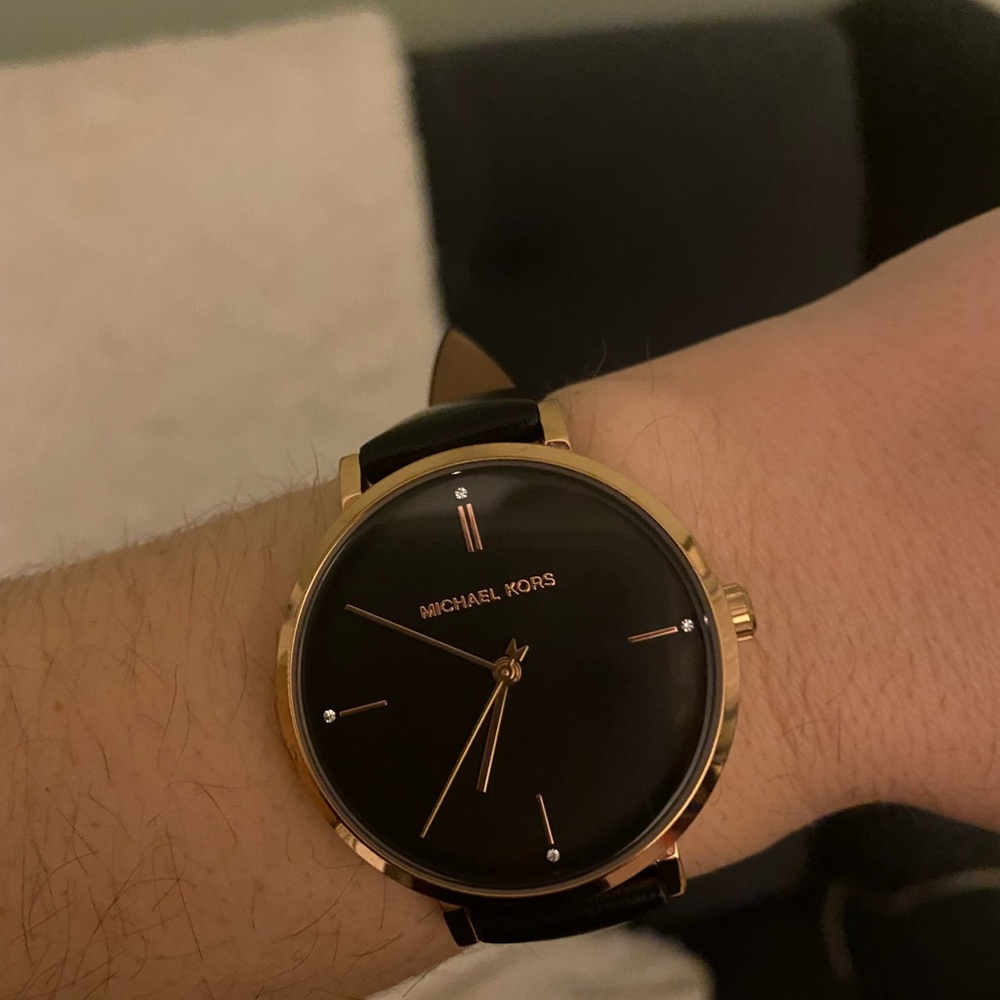 Michael Kors Bought brand new and have wore a handful of times. Great condition